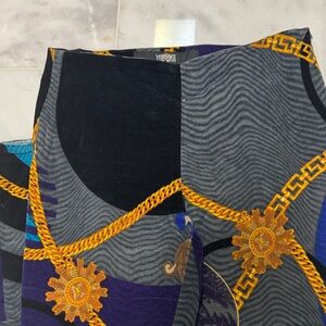 Versace Gold and Purple Patterned Trousers. Gently worn. Precut hem. Suede like
